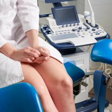 Woman at gynecologist office sitting and waiting