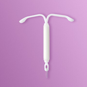 Image of a Mirena Contraceptive Coil on a purple background